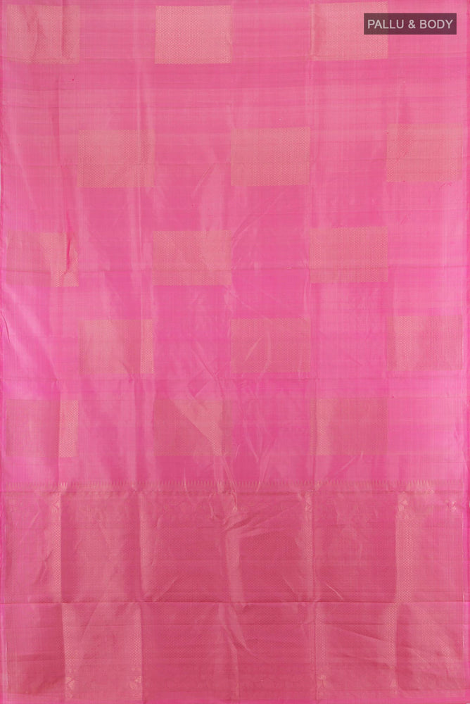 Flat view of Rose pink Soft Silk Saree with Zari Butta on the body and Silk Border. 