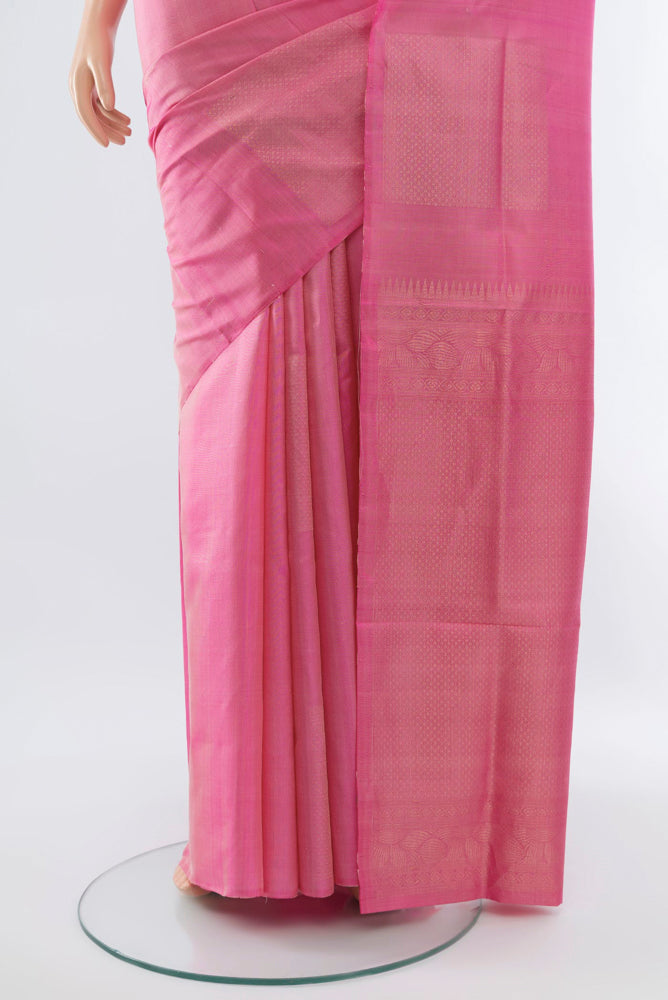 Pleats and pallu of Rose pink Soft Silk Saree with Zari Butta on the body and Silk Border. 