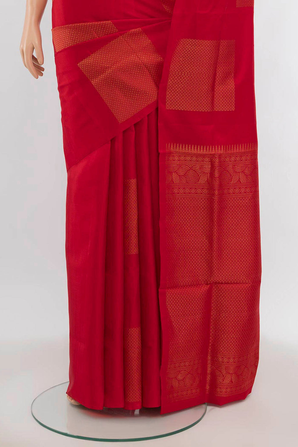 Pleats and pallu of Red Soft Silk Saree with Zari Butta on the body and Silk Border. 