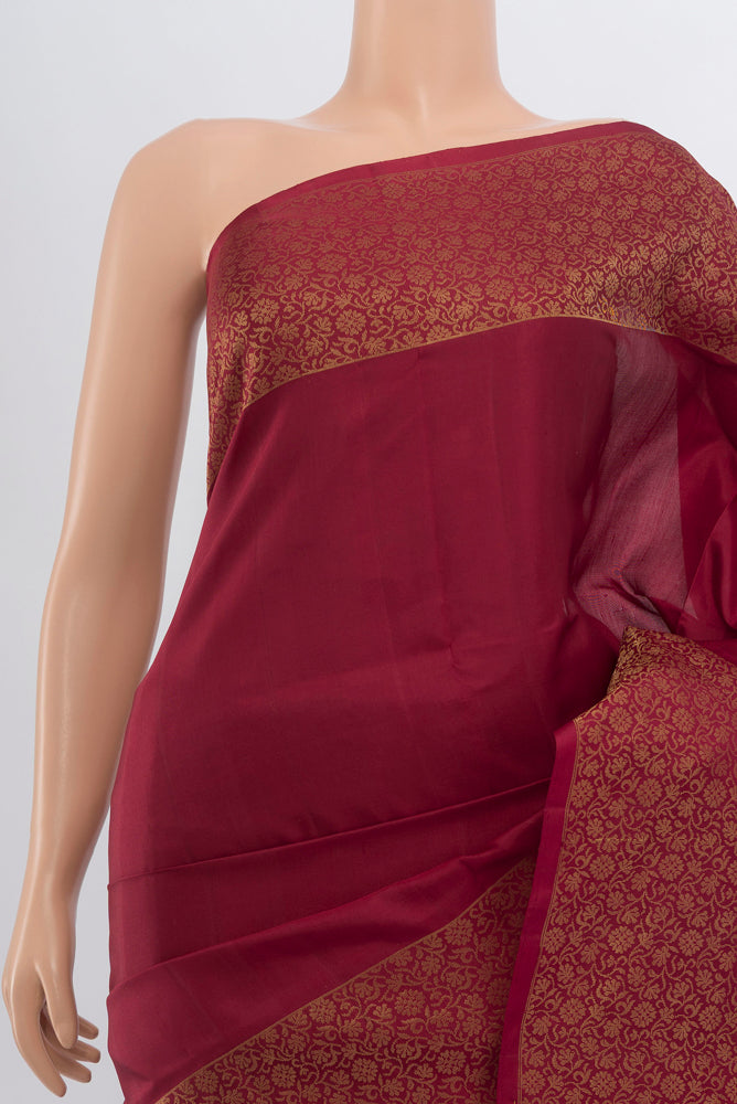 Border image of Maroon Soft Silk Saree with Zari Butta on the body and Silk Border. 