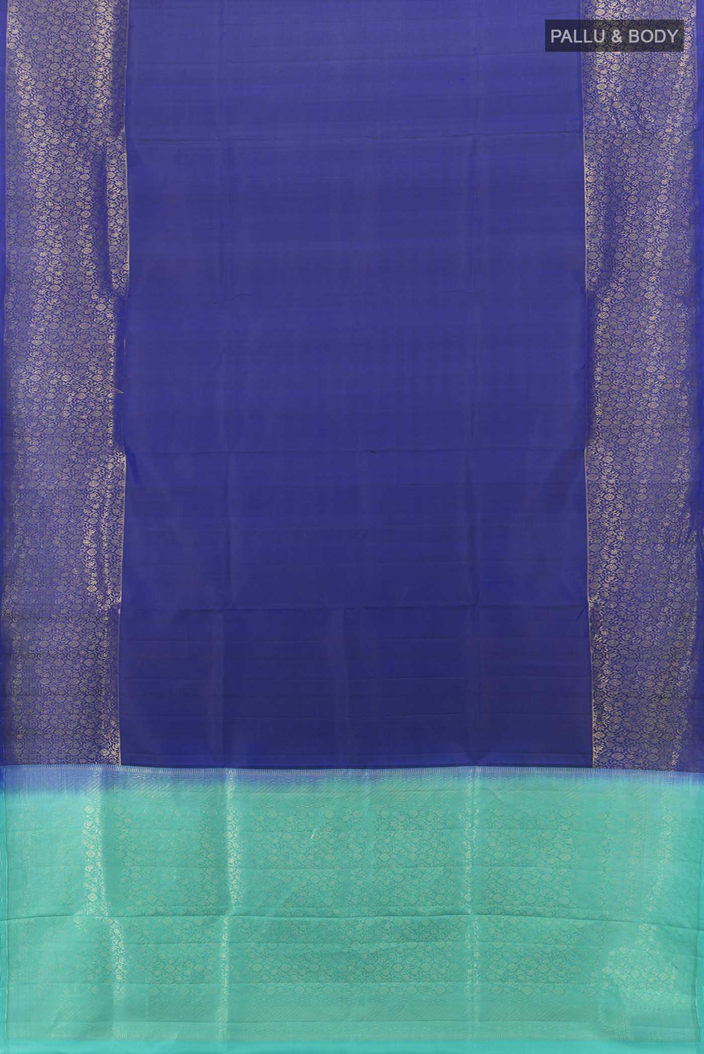 Flat view of Navy Blue Soft Silk Saree with Zari Butta on the body and Zari Border. 