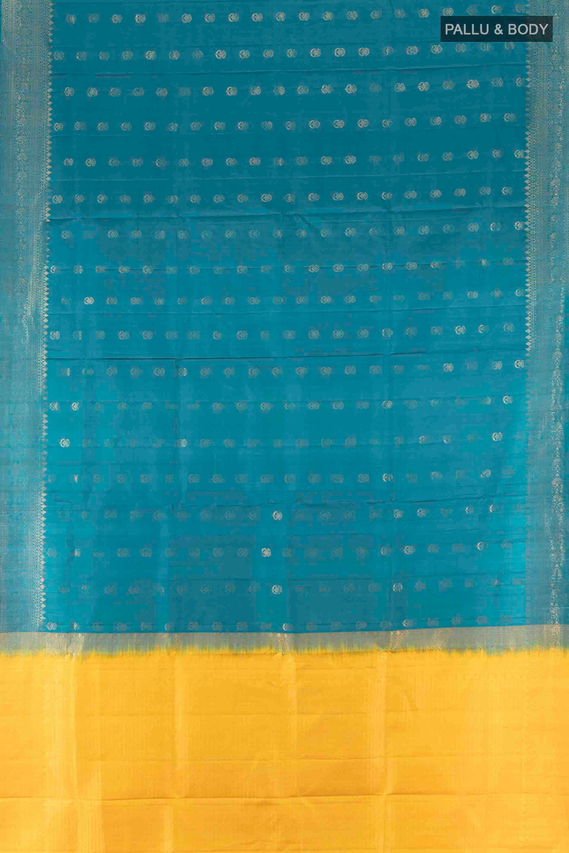 Flat view of Light Blue Soft Silk Saree with Zari Butta on the body and Zari Border
