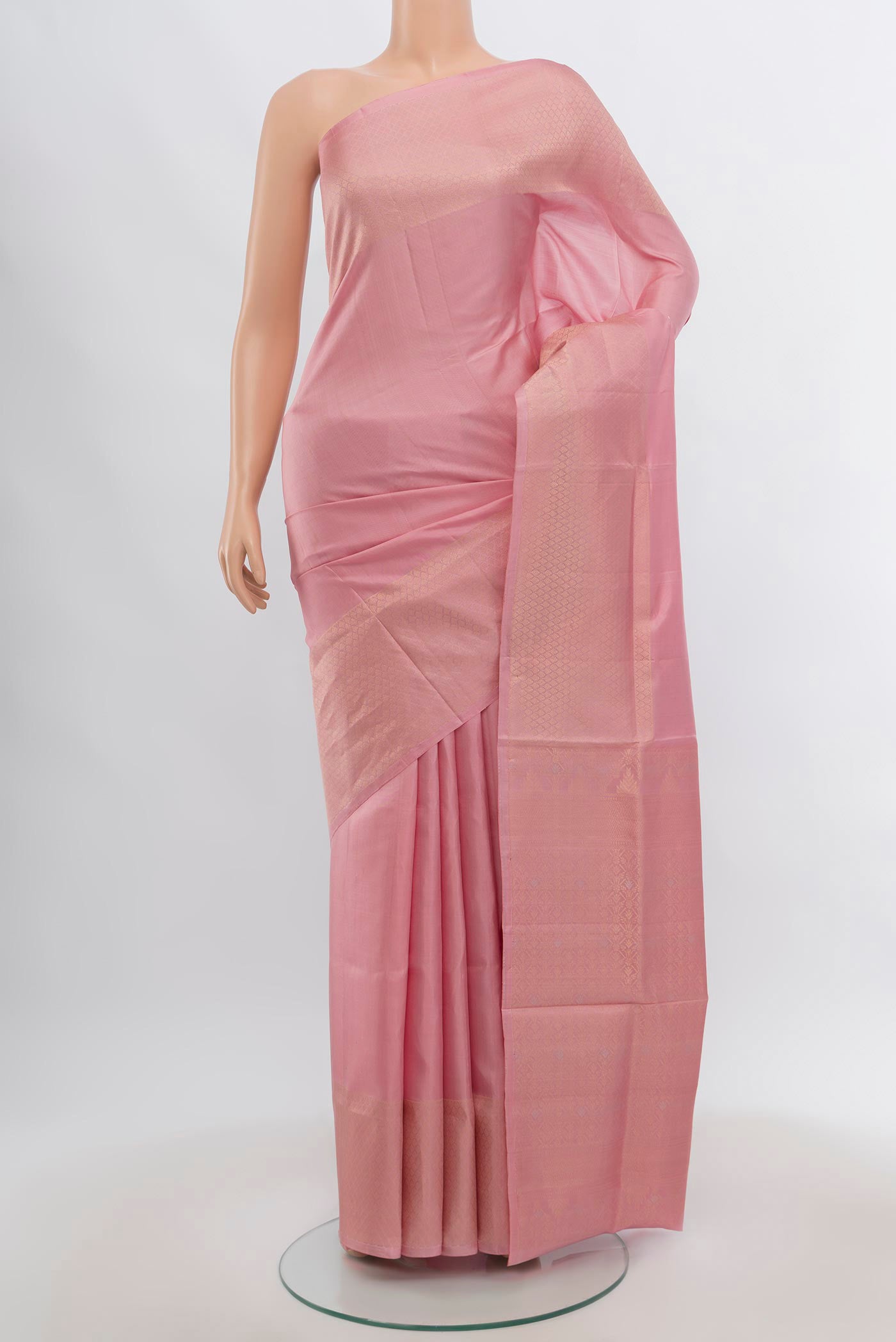 Rose pink Soft Silk Saree with Zari Butta on the body and Zari Border.  displayed on a mannequin