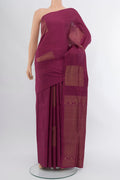 Bronze Soft Silk Saree with Zari Butta on the body and Silk Border.  displayed on a mannequin