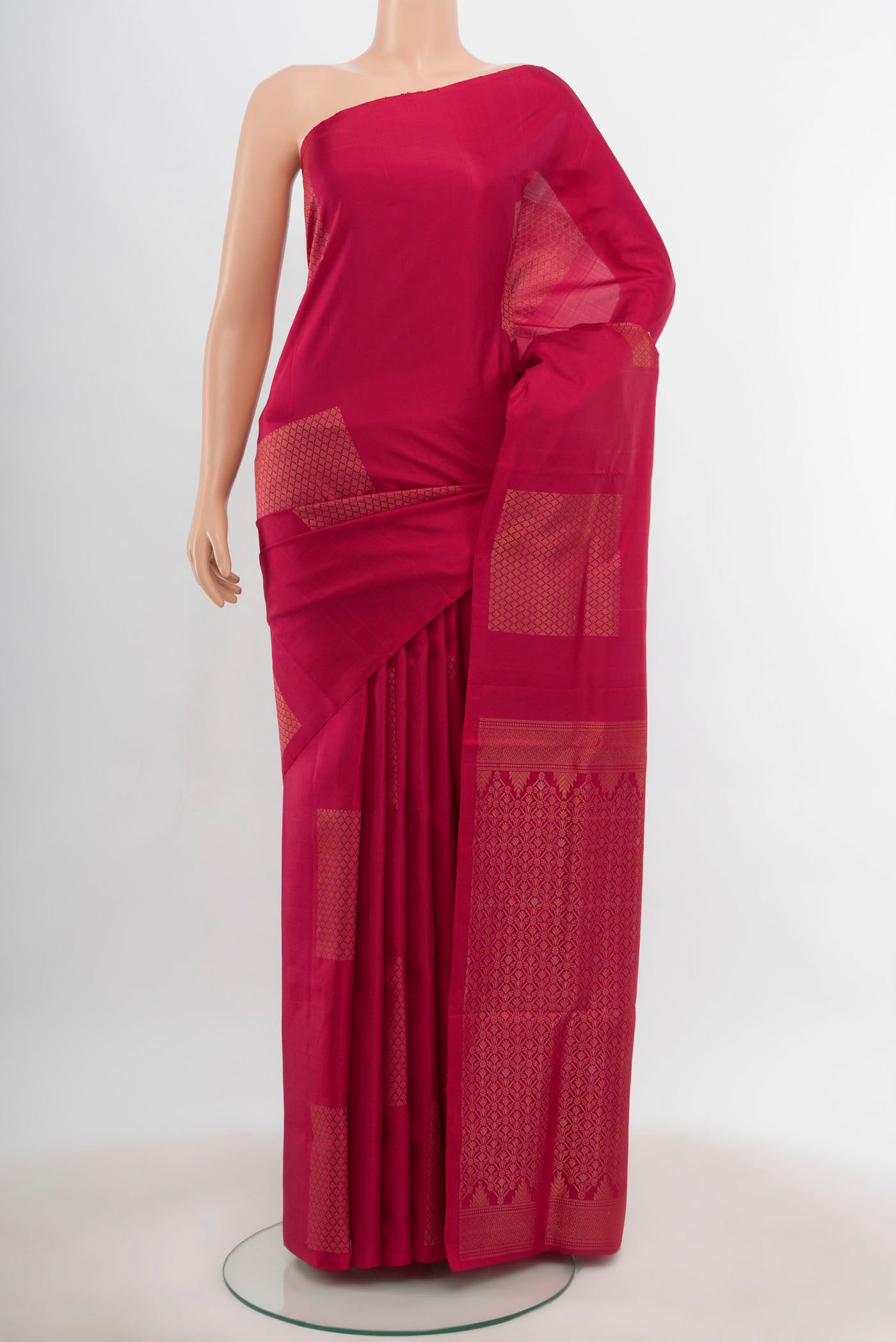 Dark Pink Soft Silk Saree with Zari Butta on the body and Silk Border.  displayed on a mannequin