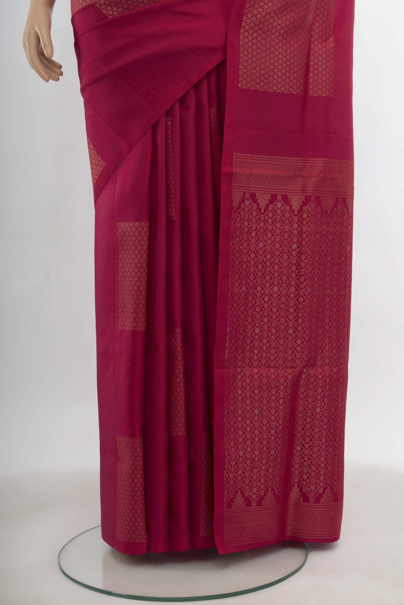 Pleats and pallu of Dark Pink Soft Silk Saree with Zari Butta on the body and Silk Border. 