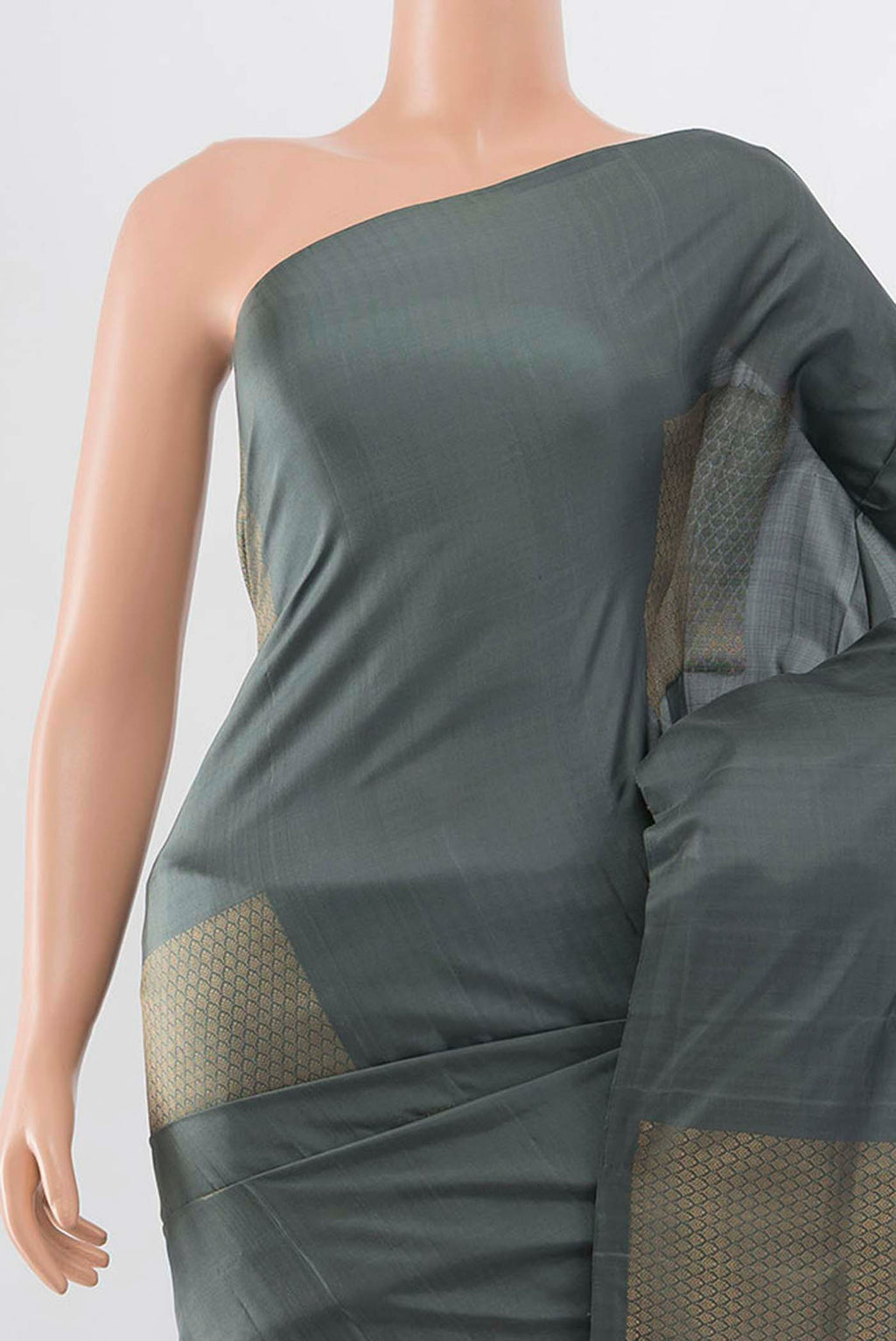 Border image of Grey Soft Silk Saree with Zari Butta on the body and Zari Border