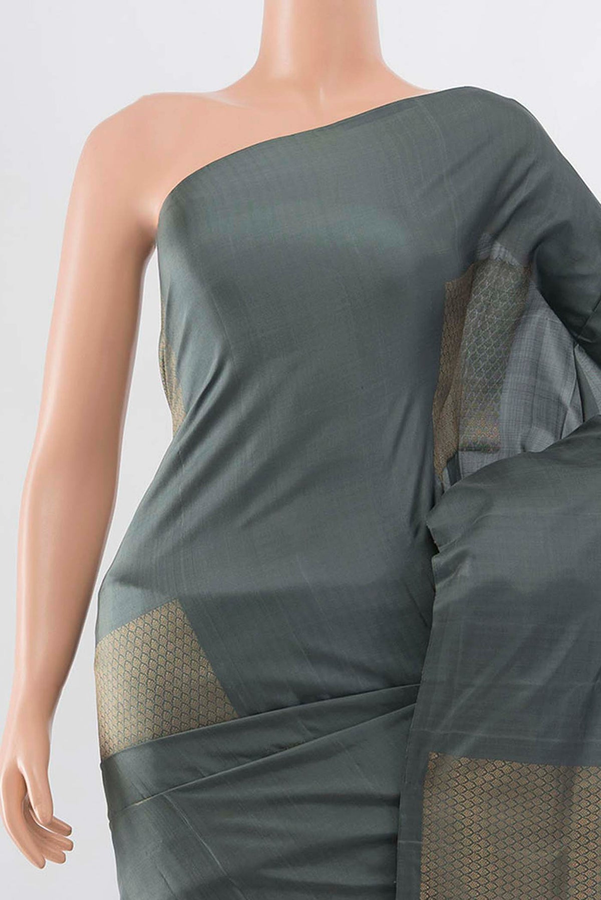 Border image of Grey Soft Silk Saree with Zari Butta on the body and Zari Border