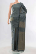 Grey Soft Silk Saree with Zari Butta on the body and Zari Border displayed on a mannequin