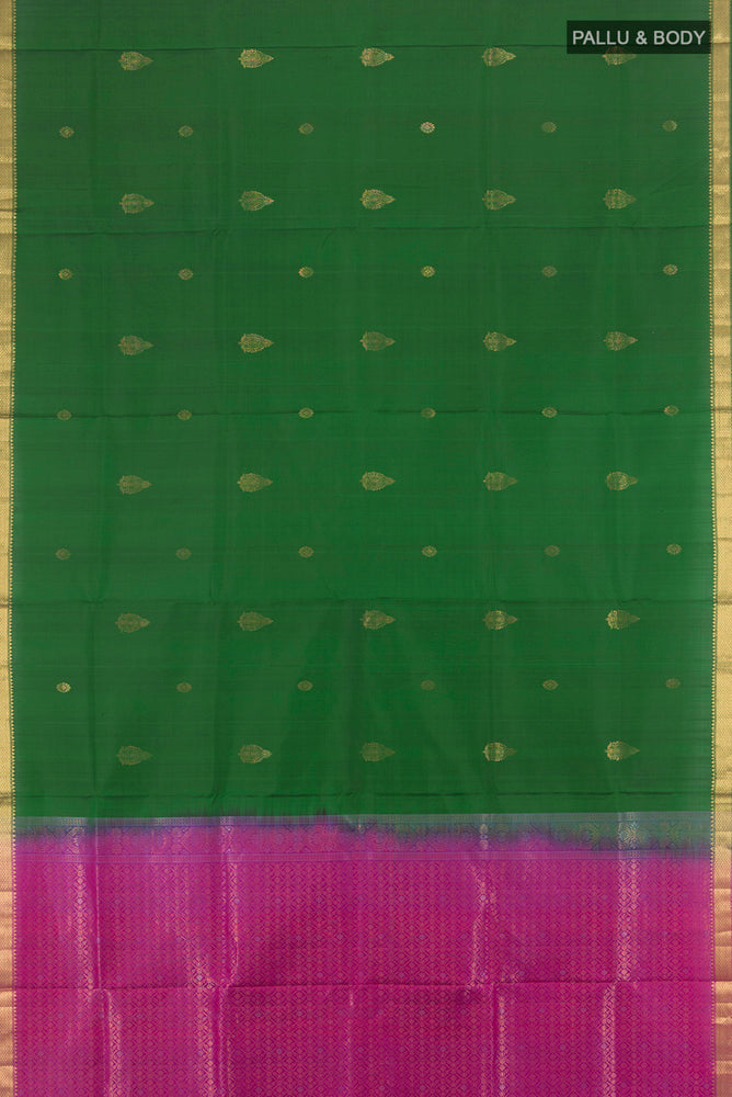 Flat view of Bottle Green Soft Silk Saree with Zari Butta on the body and Silk Border. 