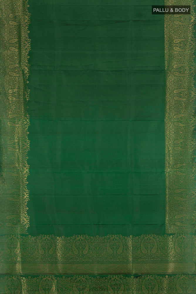 Flat view of Bottle Green Soft Silk Saree with Zari Butta on the body and Silk Border. 