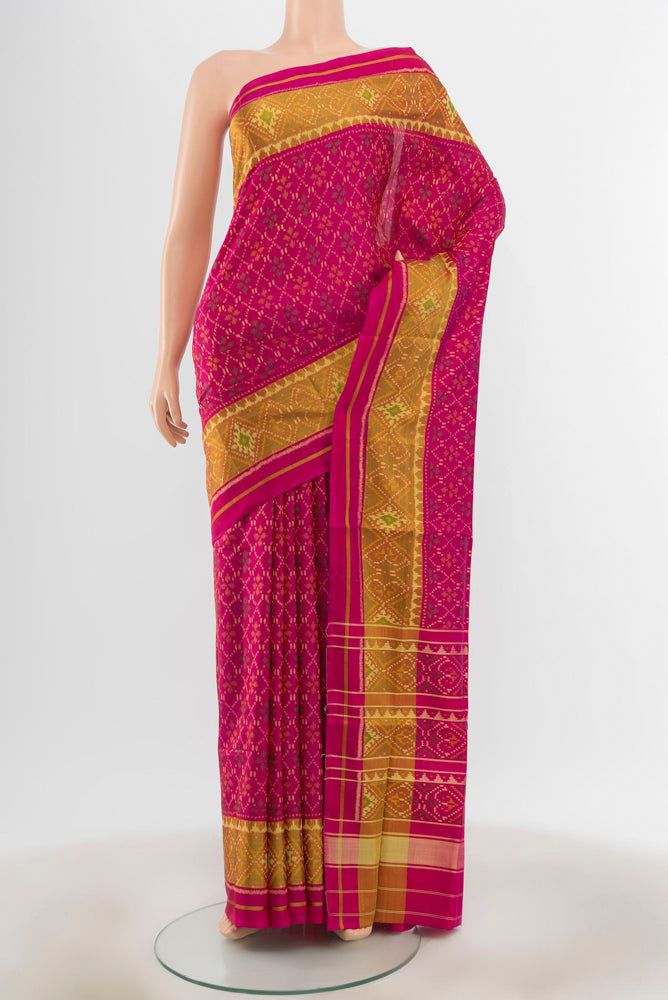 Rani Pink Pochampally Saree with Ikat Print on the body and Silk Border.  displayed on a mannequin