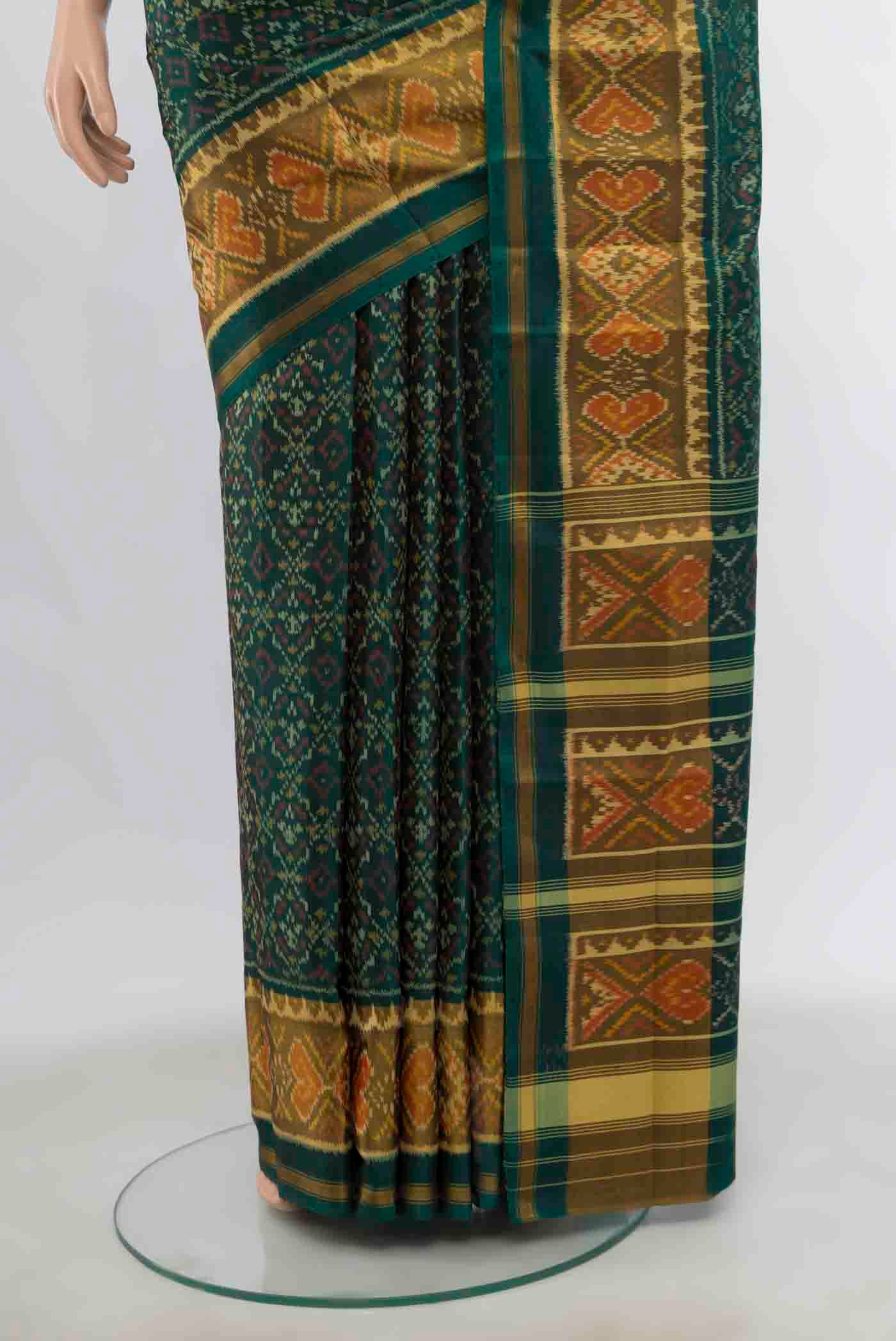 Pleats and pallu of Green Rajkot Patola Silk Saree with Pure Ikat on the body and Ikat Border