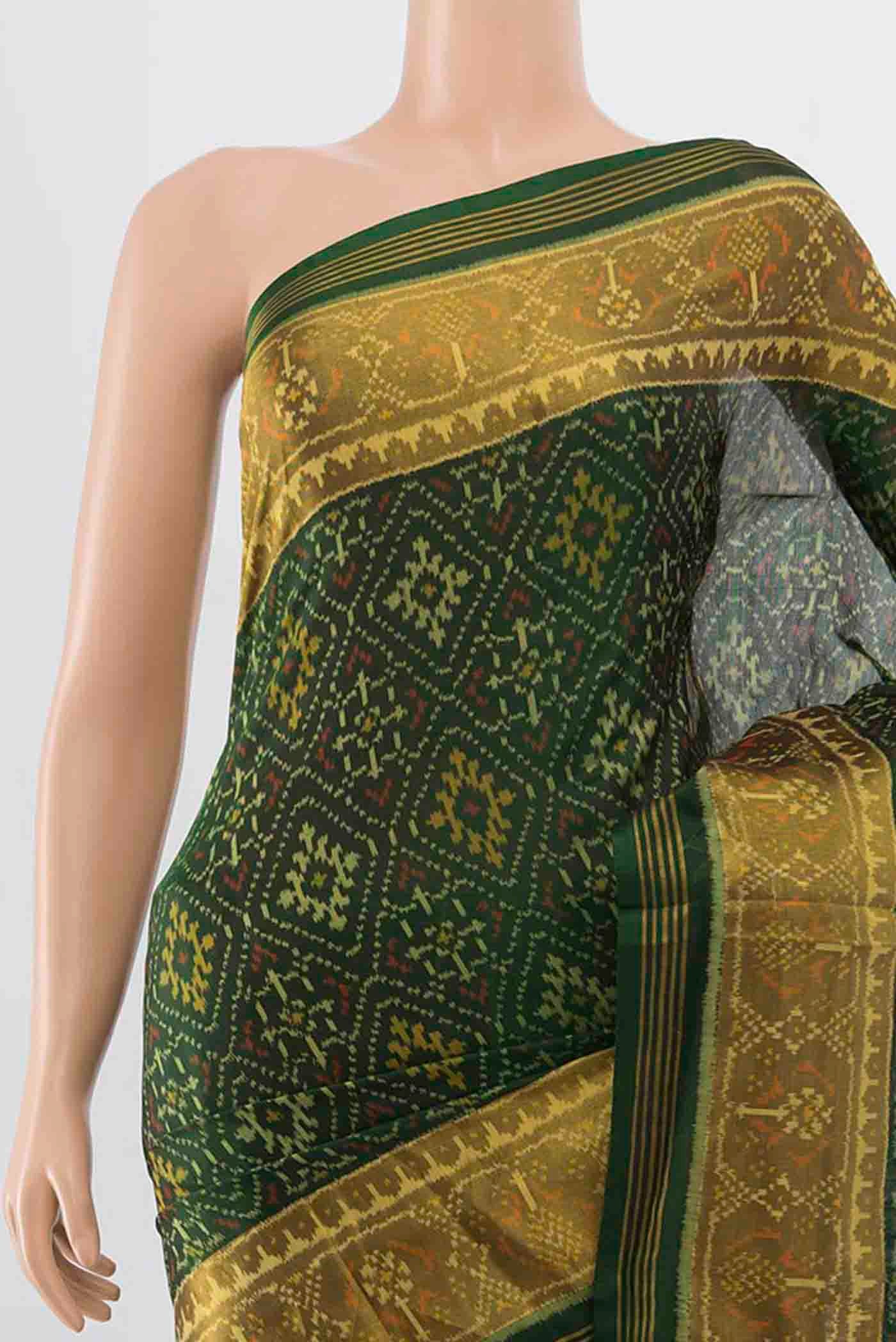 Border image of Bottle Green Rajkot Patola Silk Saree with Pure Ikat on the body and Zari Border