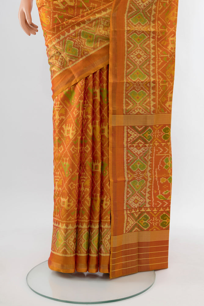 Pleats and pallu of Multi Color Rajkot Patola Silk Saree with Zari Butta on the body and Silk Border. 