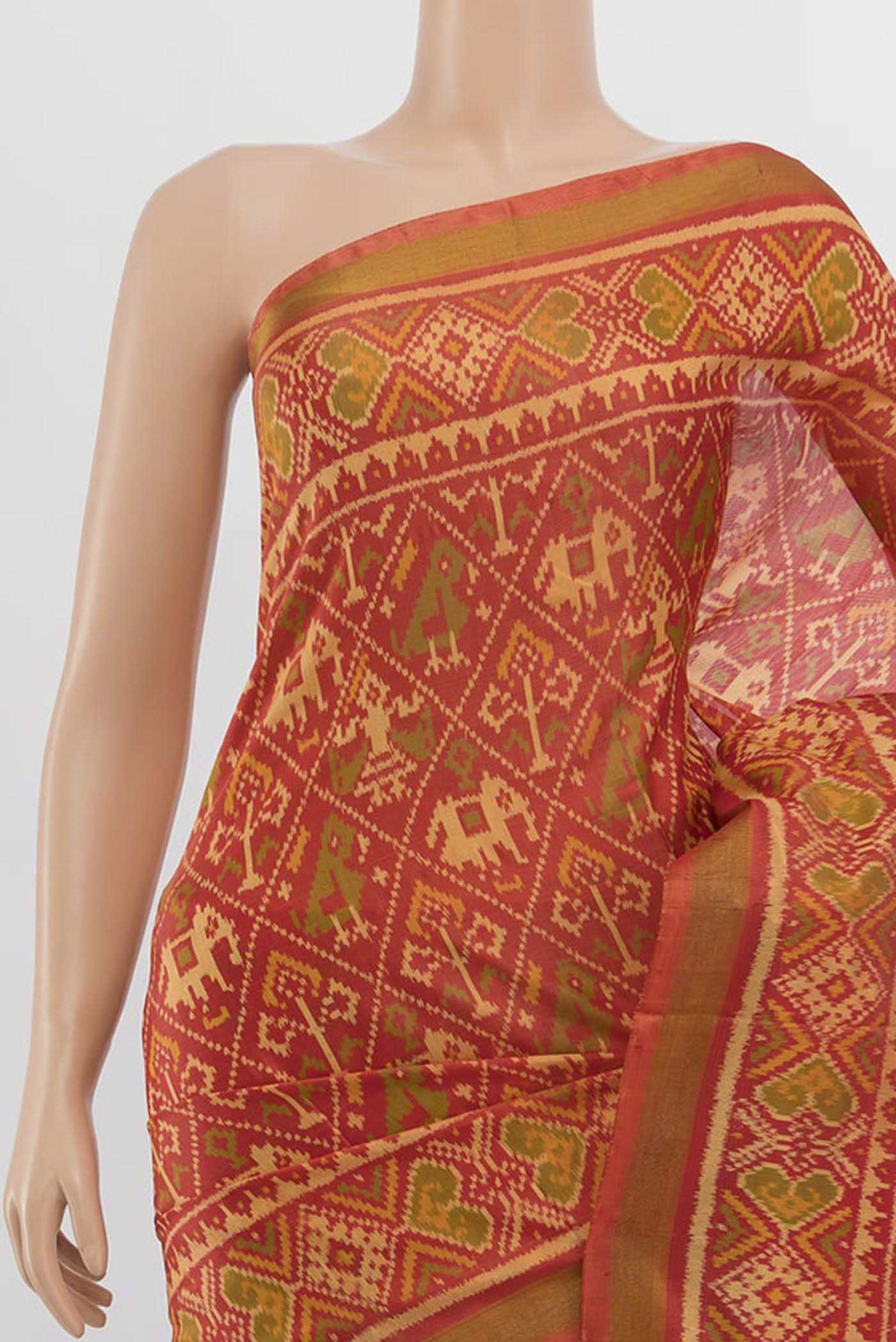 Border image of Peach Rajkot Patola Silk Saree with Zari Butta on the body and Silk Border. 