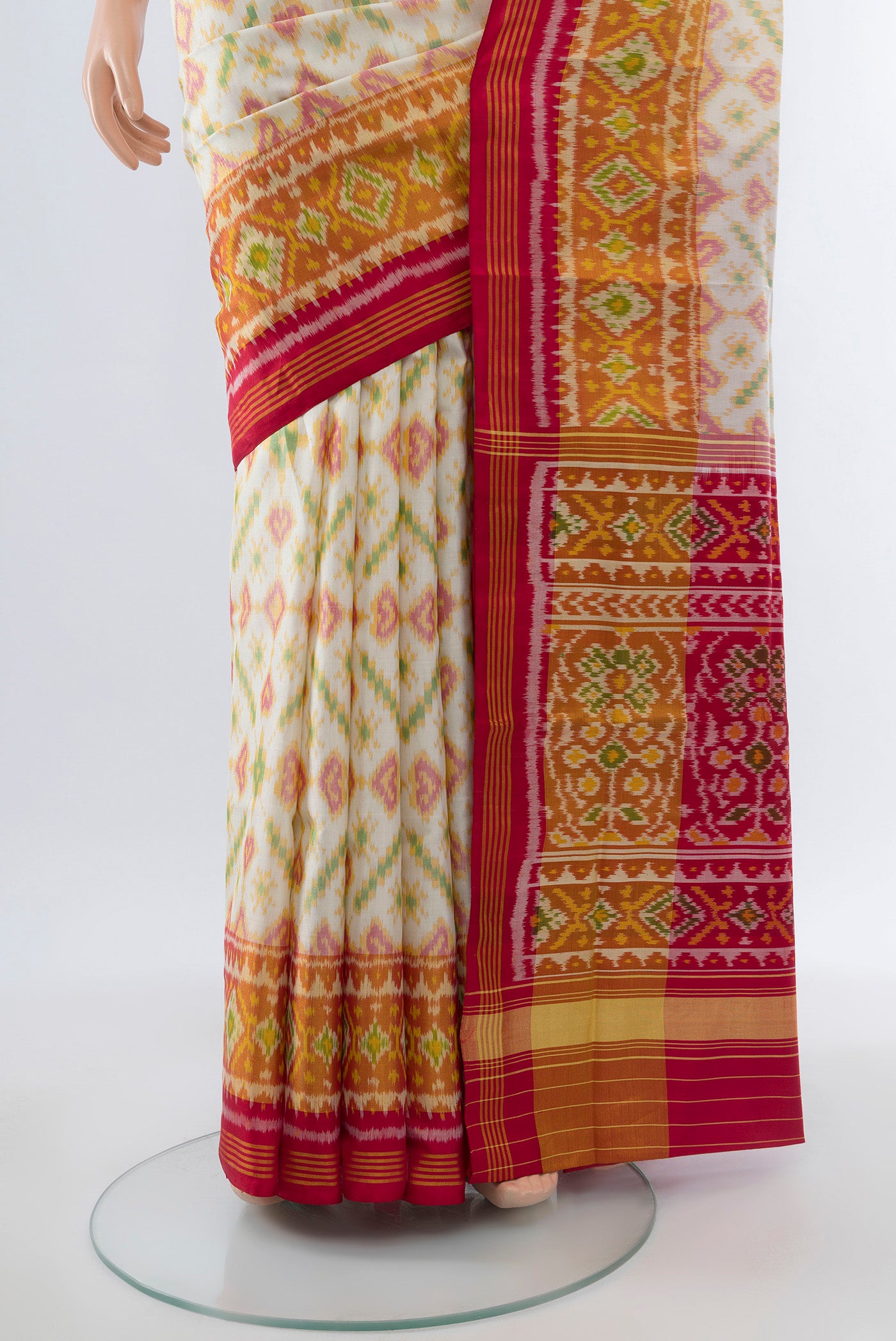 Pleats and pallu of Multi Color Rajkot Patola Silk Saree with Ikat Print on the body and Silk Border. 