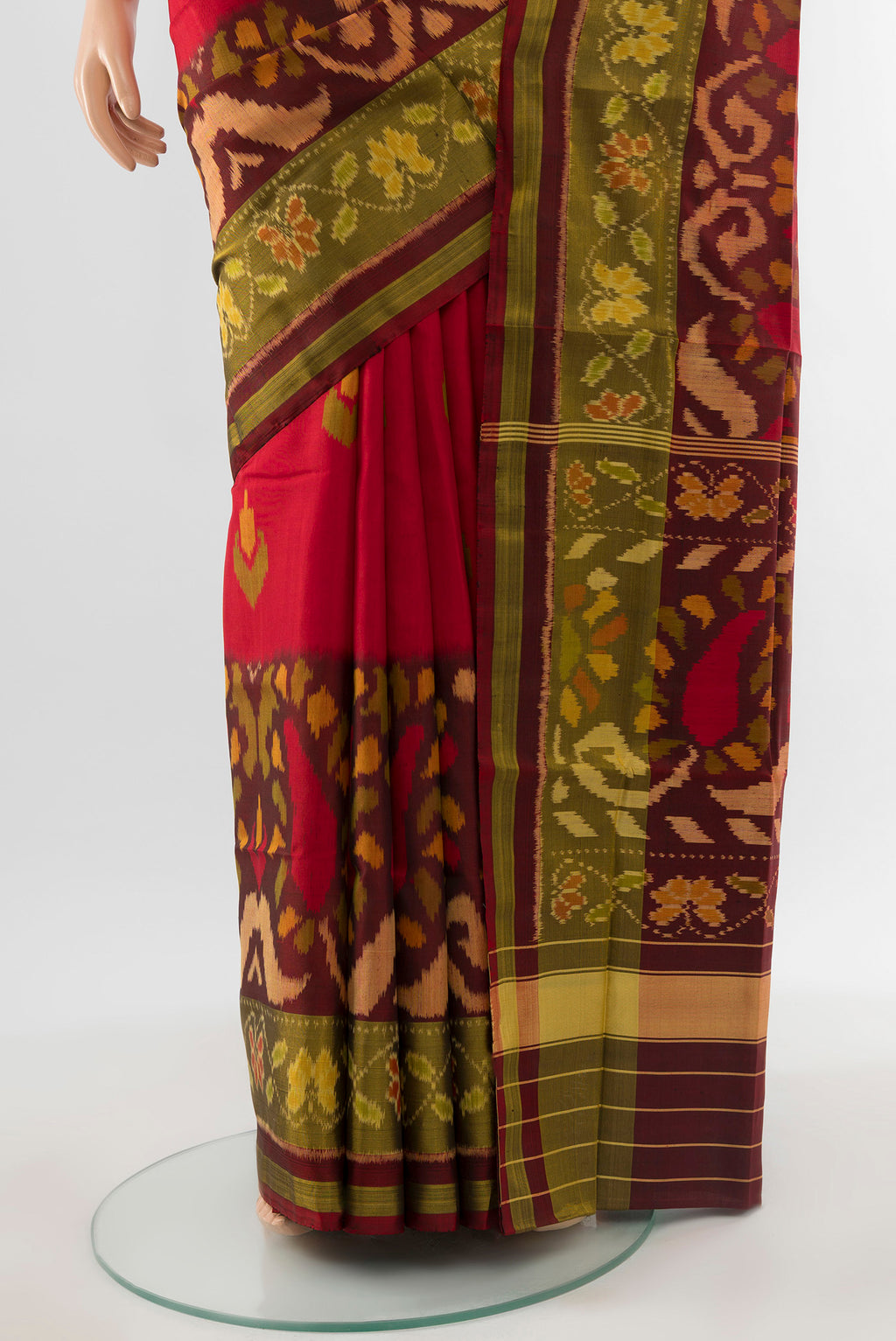 Pleats and pallu of Multi Color Rajkot Patola Silk Saree with Ikat Print on the body and Silk Border. 
