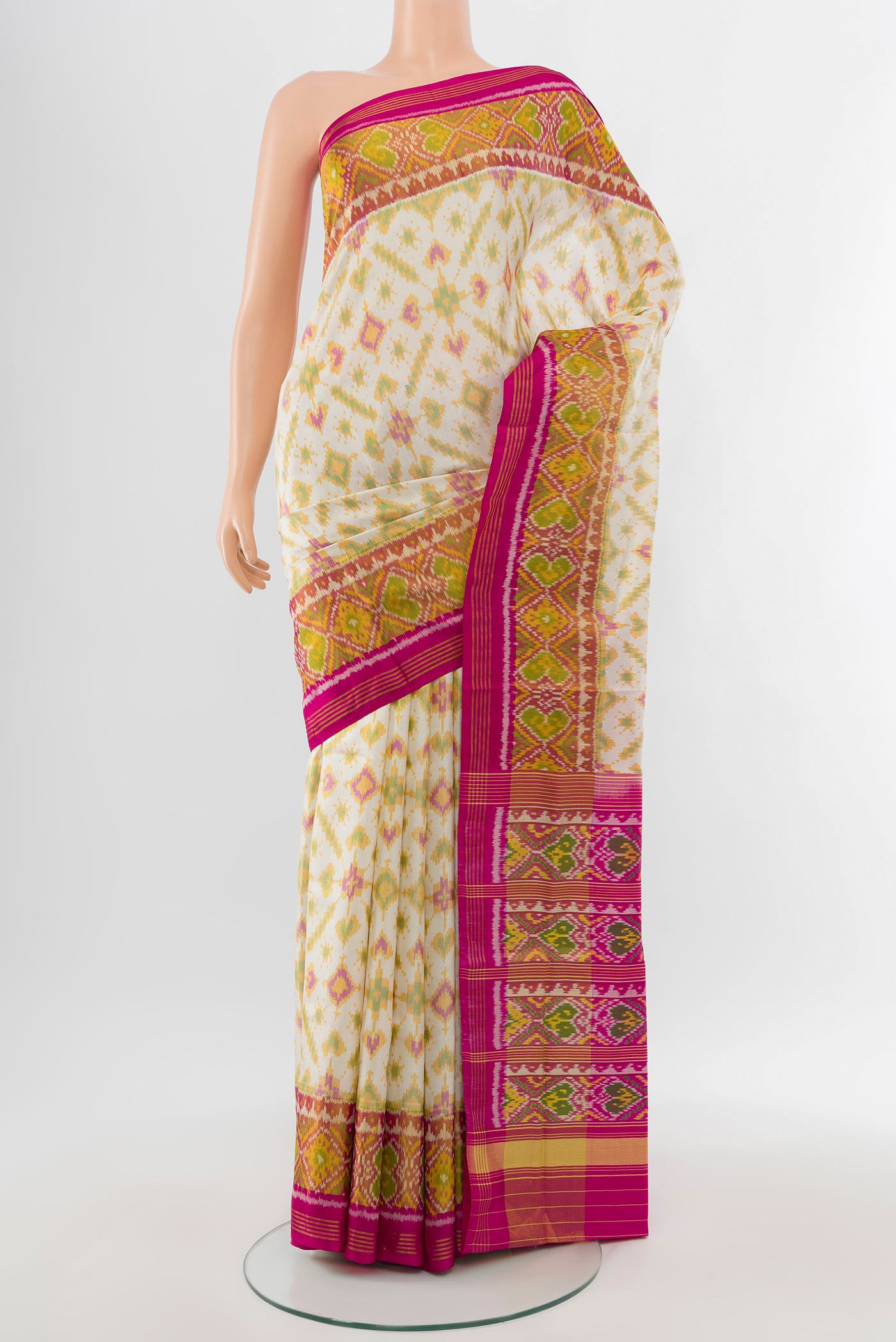 Multi Color Pochampally Saree with Ikat Print on the body and Silk Border.  displayed on a mannequin