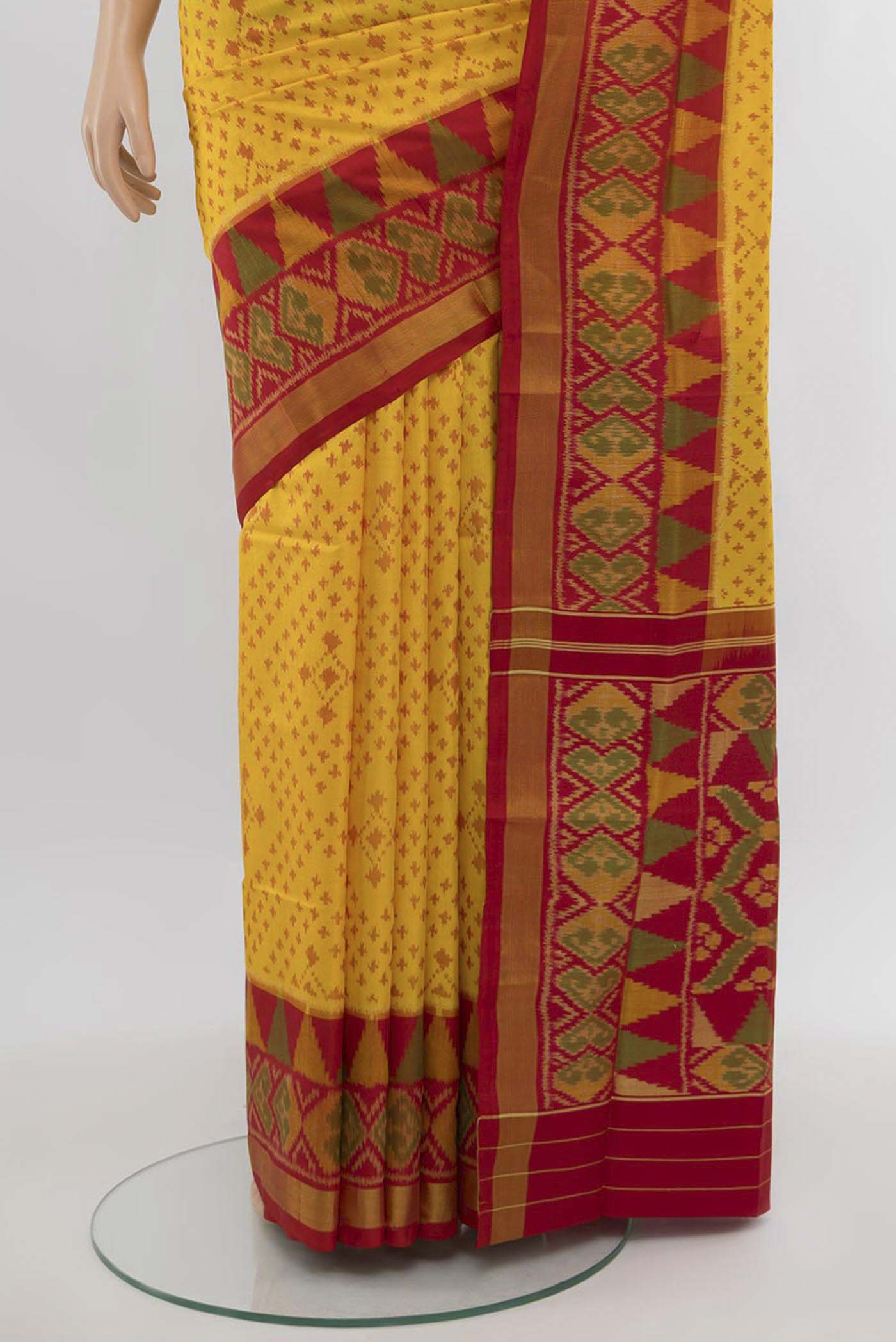 Pleats and pallu of Yellow Rajkot Patola Silk Saree with Ikat Print on the body and Silk Border. 