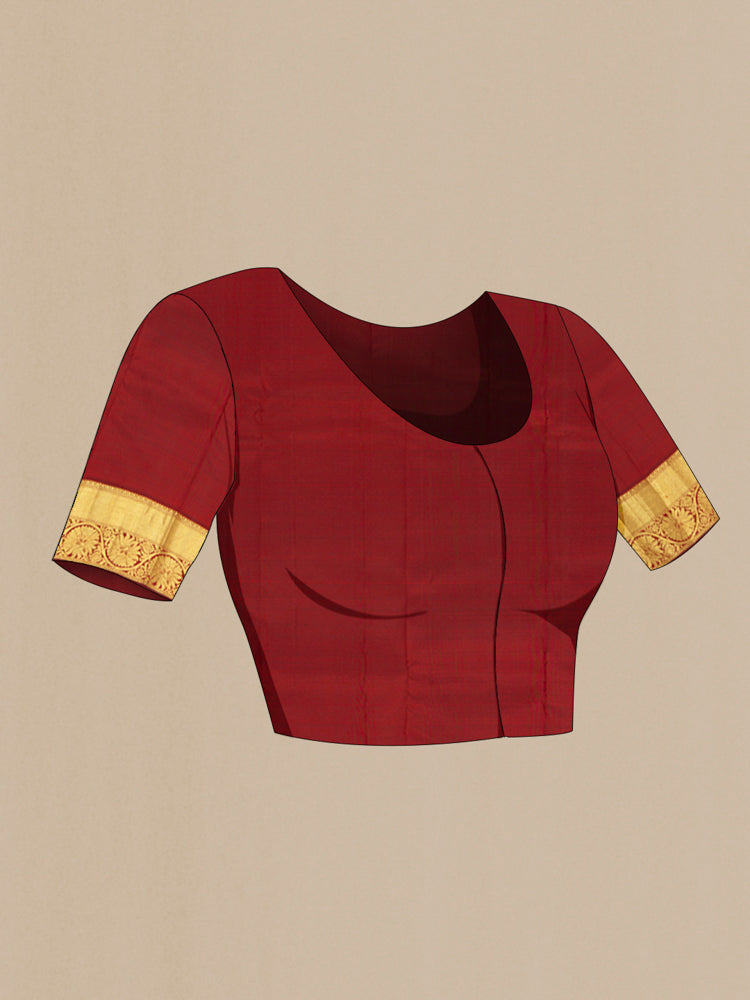 Close up image of the blouse of Maroon Kanchipuram Silk Saree with Zari Butta on the body and Silk Border. 