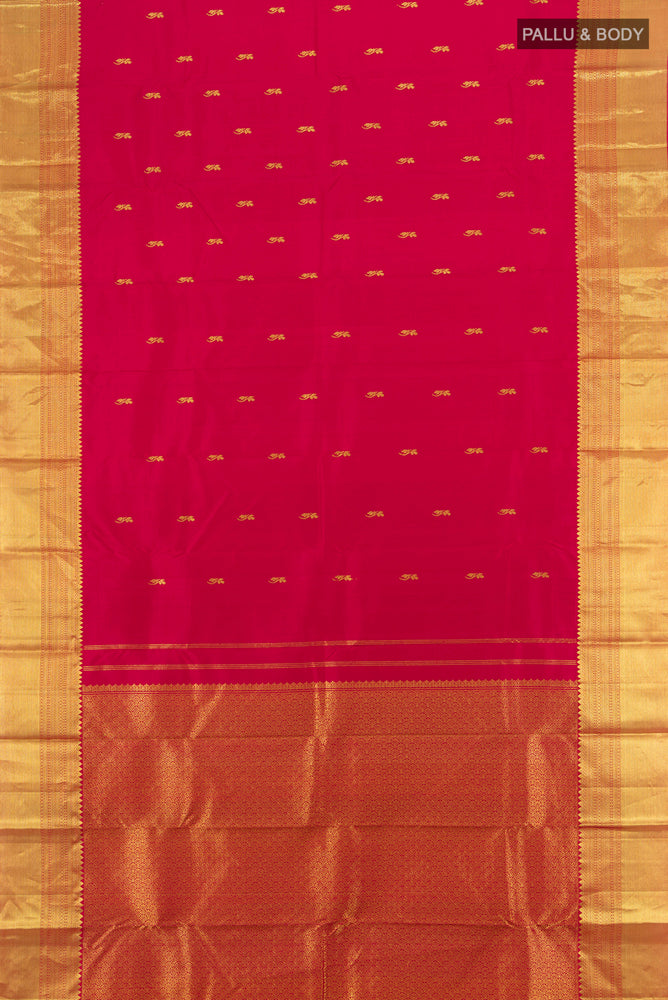Flat view of Pure Silk Pure Zari Maroon Kanchipuram Saree with Zari Butta on the body and Silk Border. 