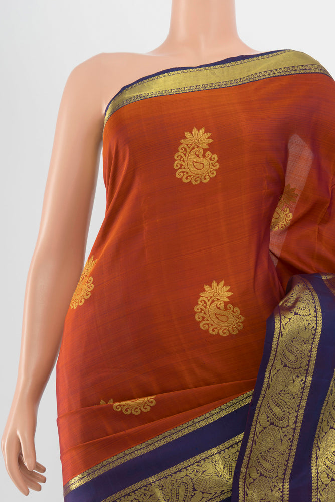 Border image of Pure Silk Pure Zari Rust Kanchipuram Saree with Zari Butta on the body and Silk Border. 