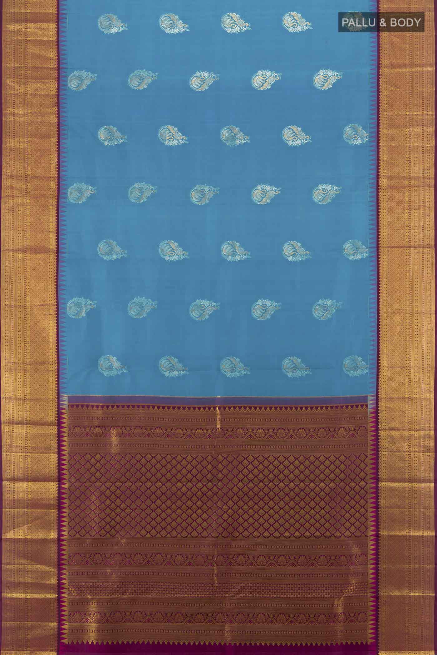 Flat view of Dark Blue Kanjivaram Silk Saree with Zari Butta on the body and Silk Border. 