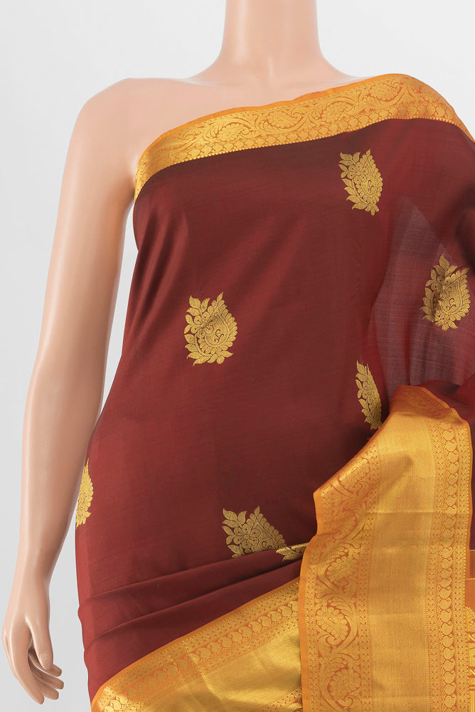 Border image of Pure Silk Pure Zari Maroon Kanchipuram Saree with Zari Butta on the body and Silk Border. 