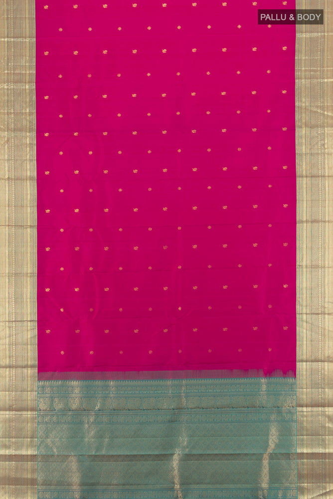 Flat view of Rani Pink Kanchipuram Silk Saree with Zari Butta on the body and Silk Border. 