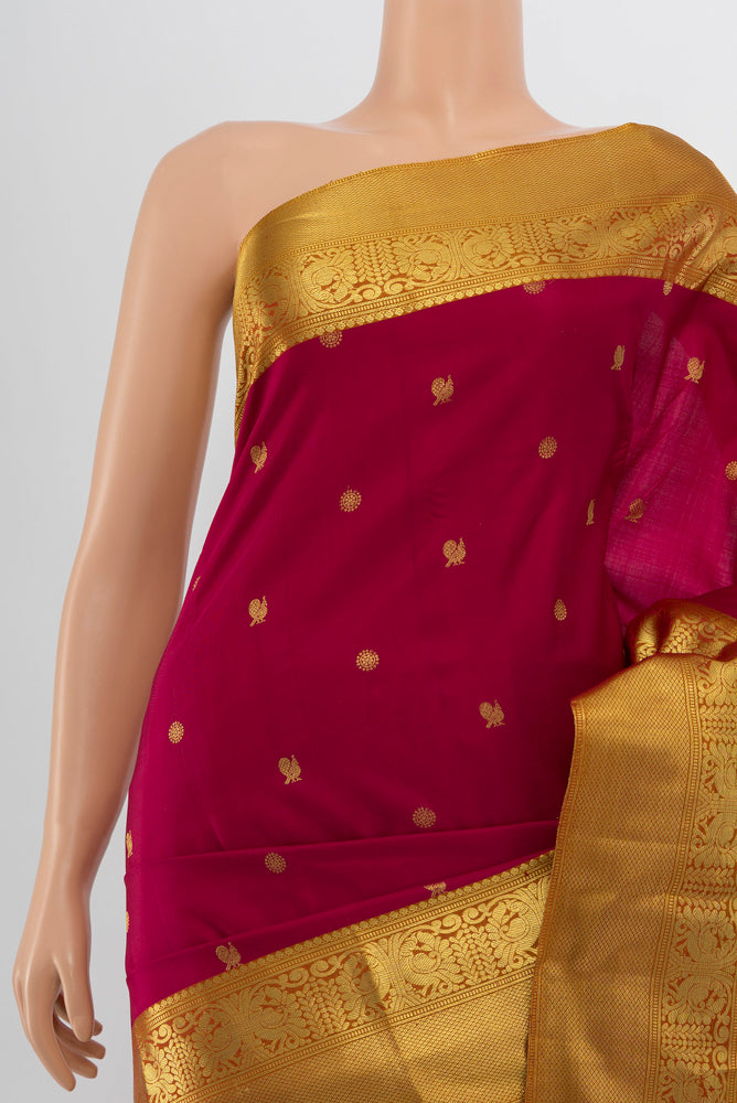 Border image of Dark Pink Kanchipuram Silk Saree with Zari Butta on the body and Silk Border. 