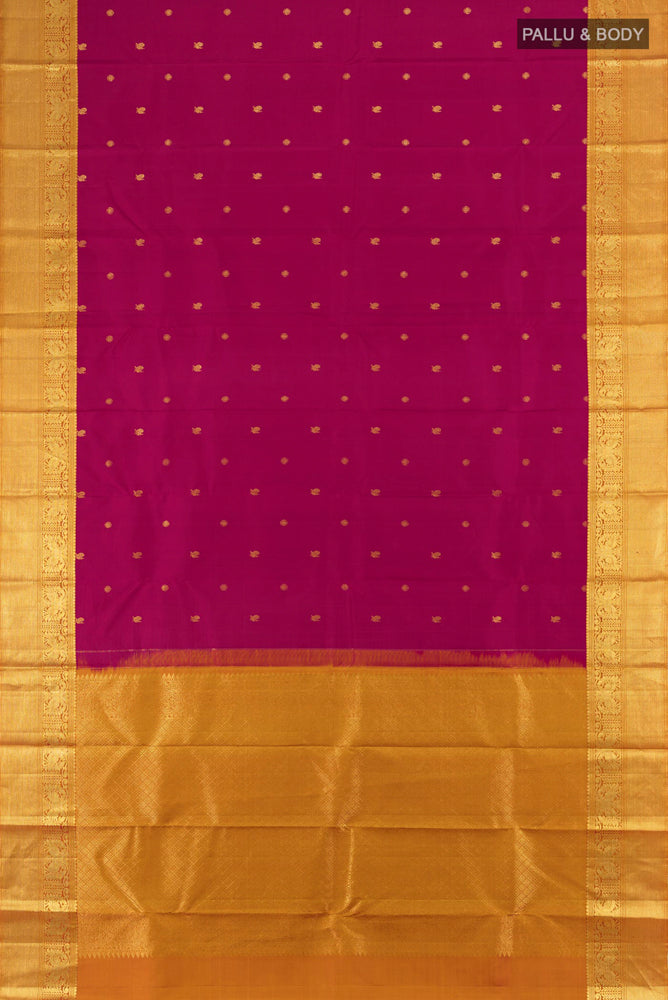 Flat view of Dark Pink Kanchipuram Silk Saree with Zari Butta on the body and Silk Border. 