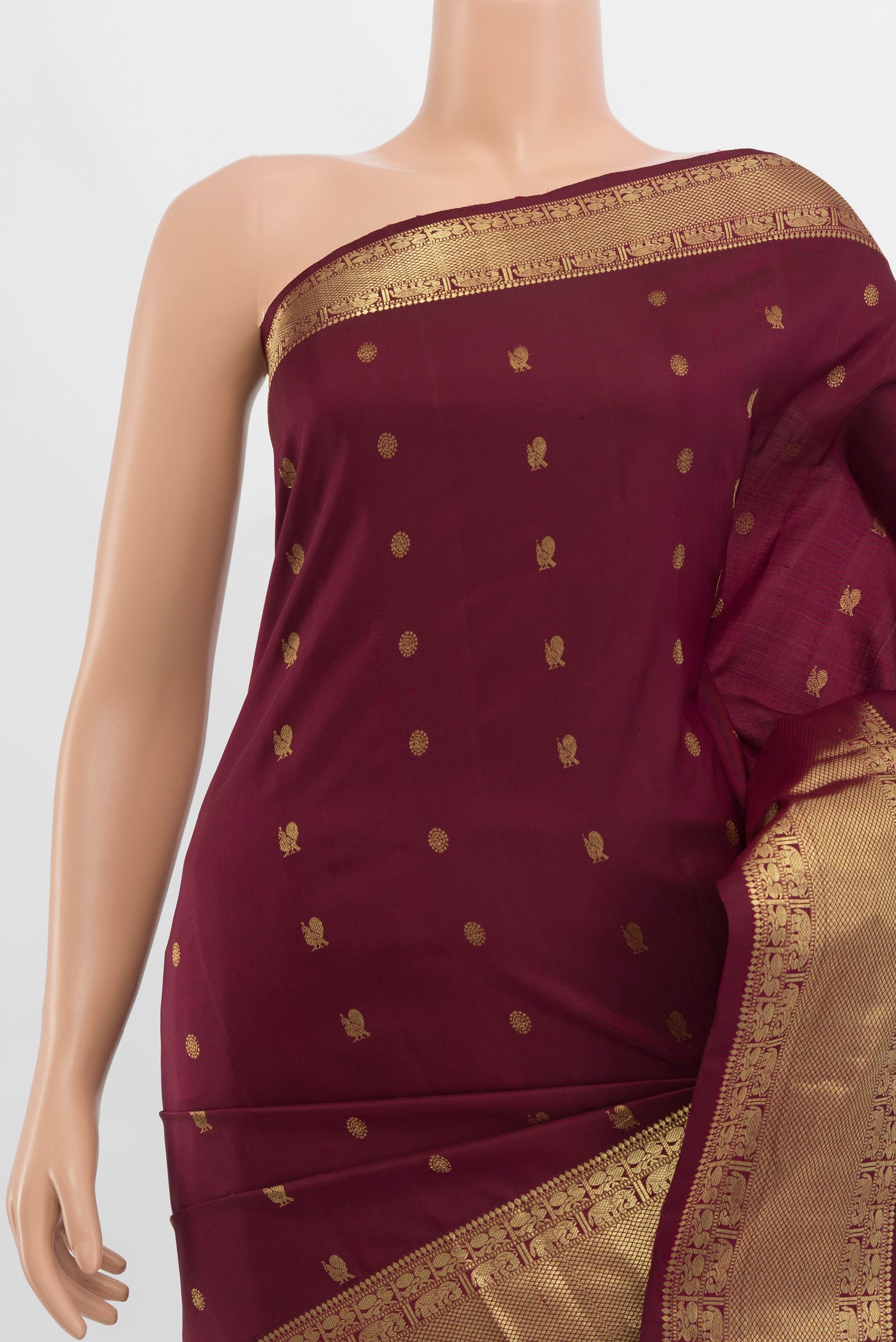 Border image of Pure Silk Pure Zari Maroon Kanchipuram Saree with Zari Butta on the body and Silk Border. 