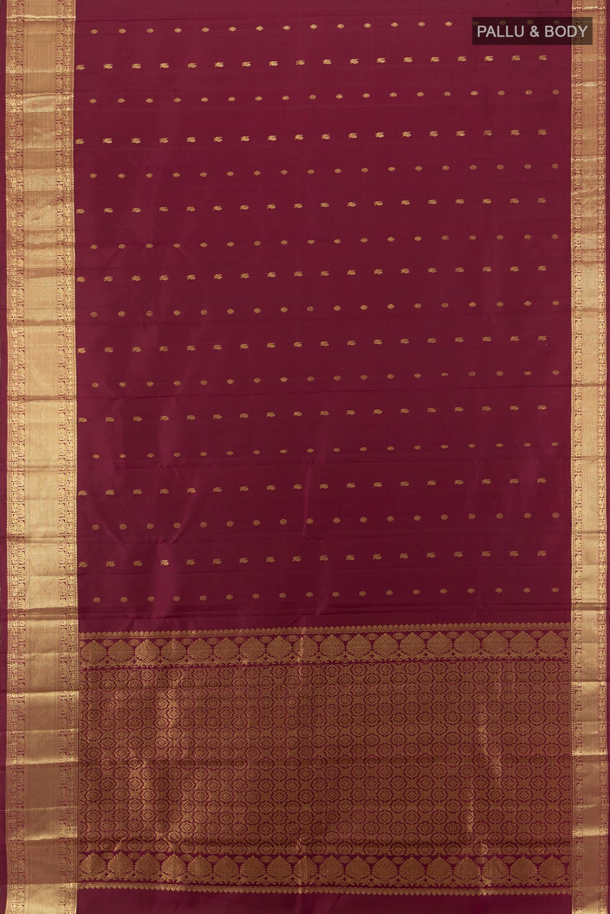 Flat view of Pure Silk Pure Zari Maroon Kanchipuram Saree with Zari Butta on the body and Silk Border. 