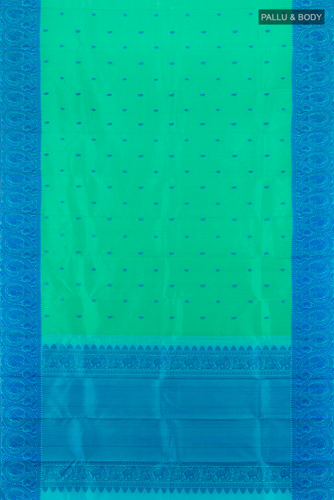Flat view of Sky Blue Kanchipuram Silk Saree with Zari Butta on the body and Silk Border. 