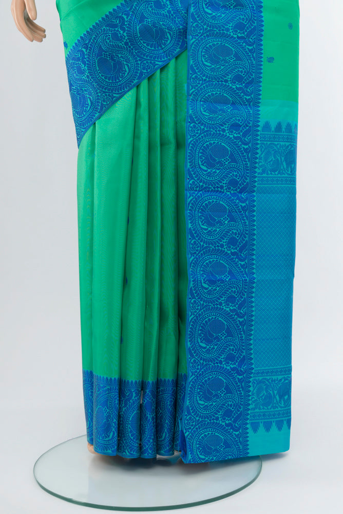 Pleats and pallu of Sky Blue Kanchipuram Silk Saree with Zari Butta on the body and Silk Border. 