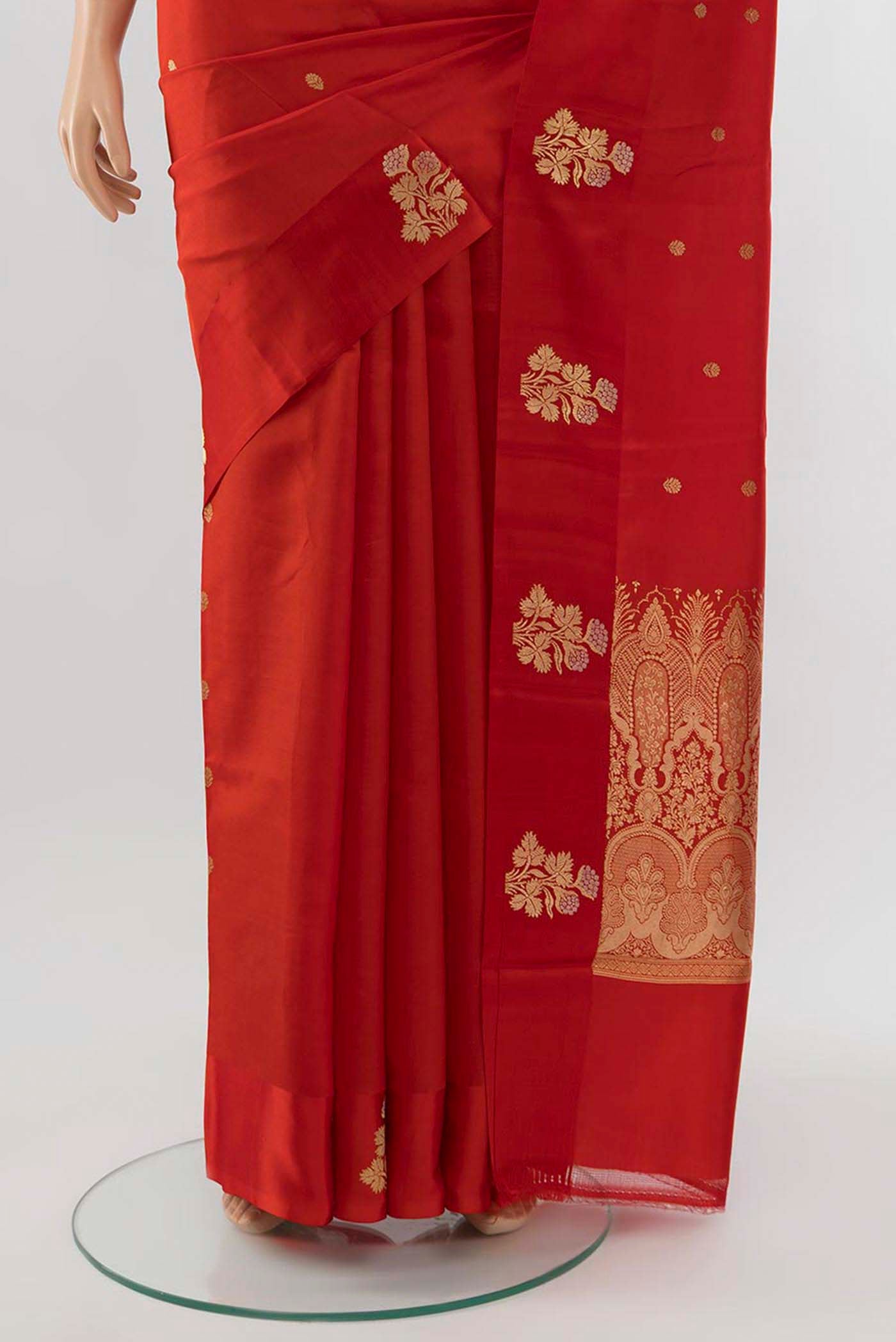 Pleats and pallu of Red Banarasi Katan Silk Saree with Zari Butta on the body and Silk Border