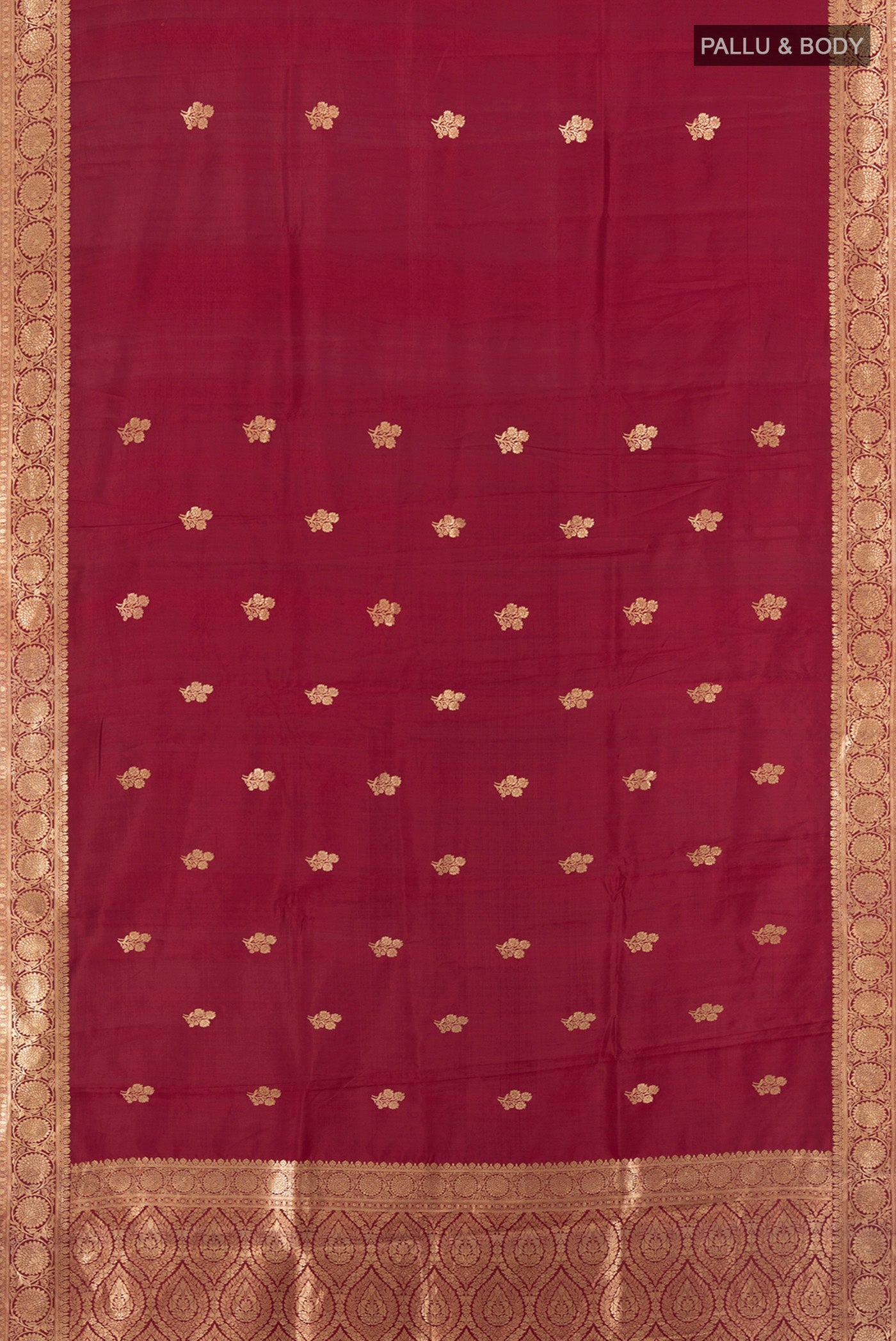 Flat view of Maroon Banarasi Katan Silk Saree with Zari Butta on the body and Zari Border. 