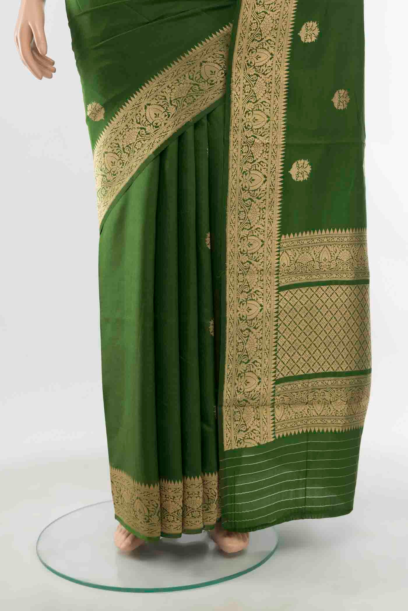 Pleats and pallu of Green Banarasi Katan Silk Saree with Zari Butta on the body and Zari Border