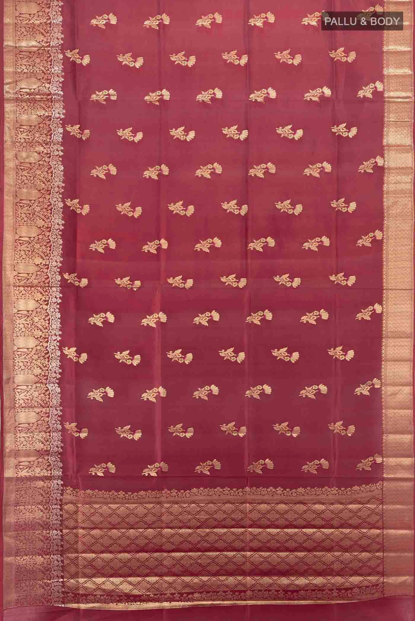 Flat view of Maroon Banarasi Raw Silk Saree with Zari Butta on the body and Silk Border