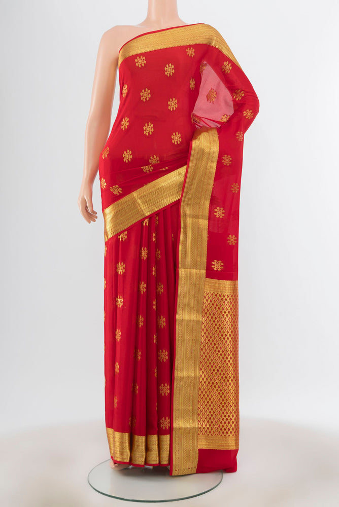 Red Mysore Silk Saree with Zari Butta on the body and Silk Border.  displayed on a mannequin