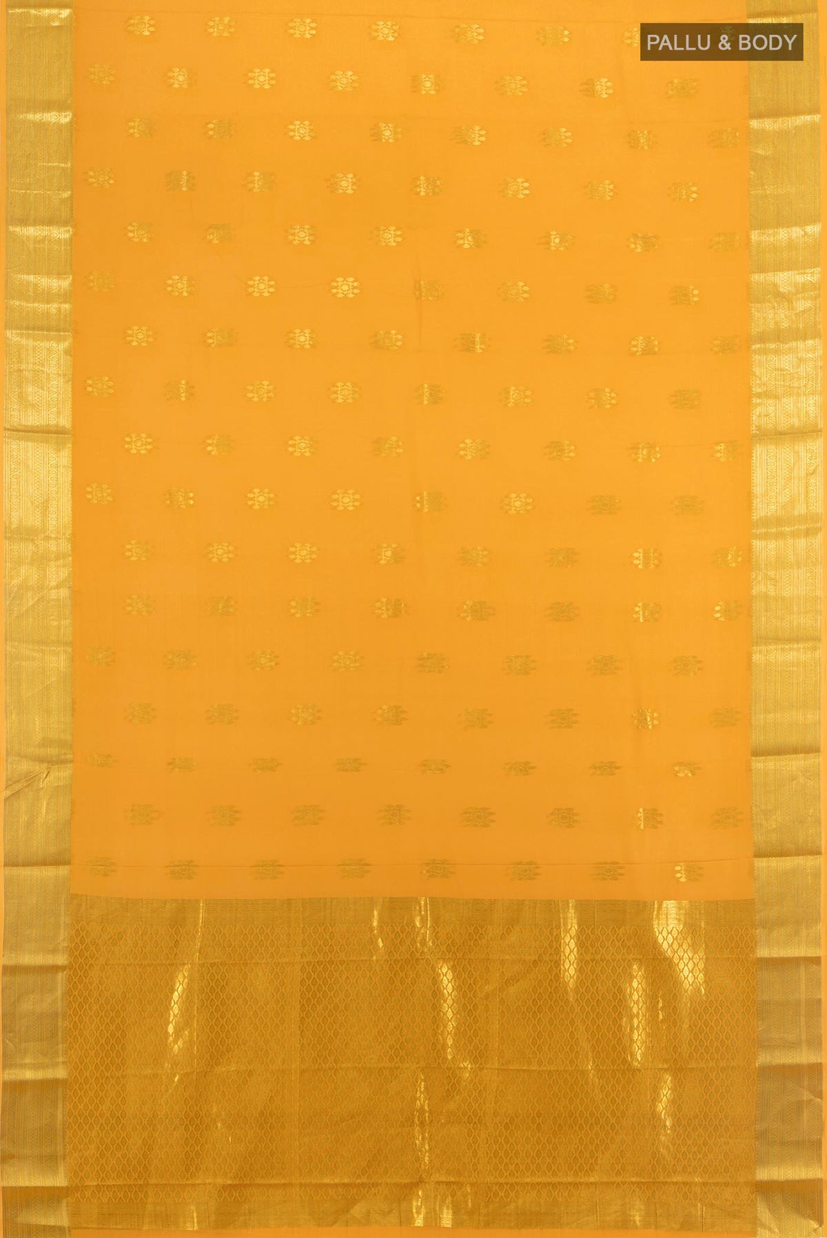 Flat view of Yellow Mysore Crepe Saree with Zari Butta on the body and Zari Border. 