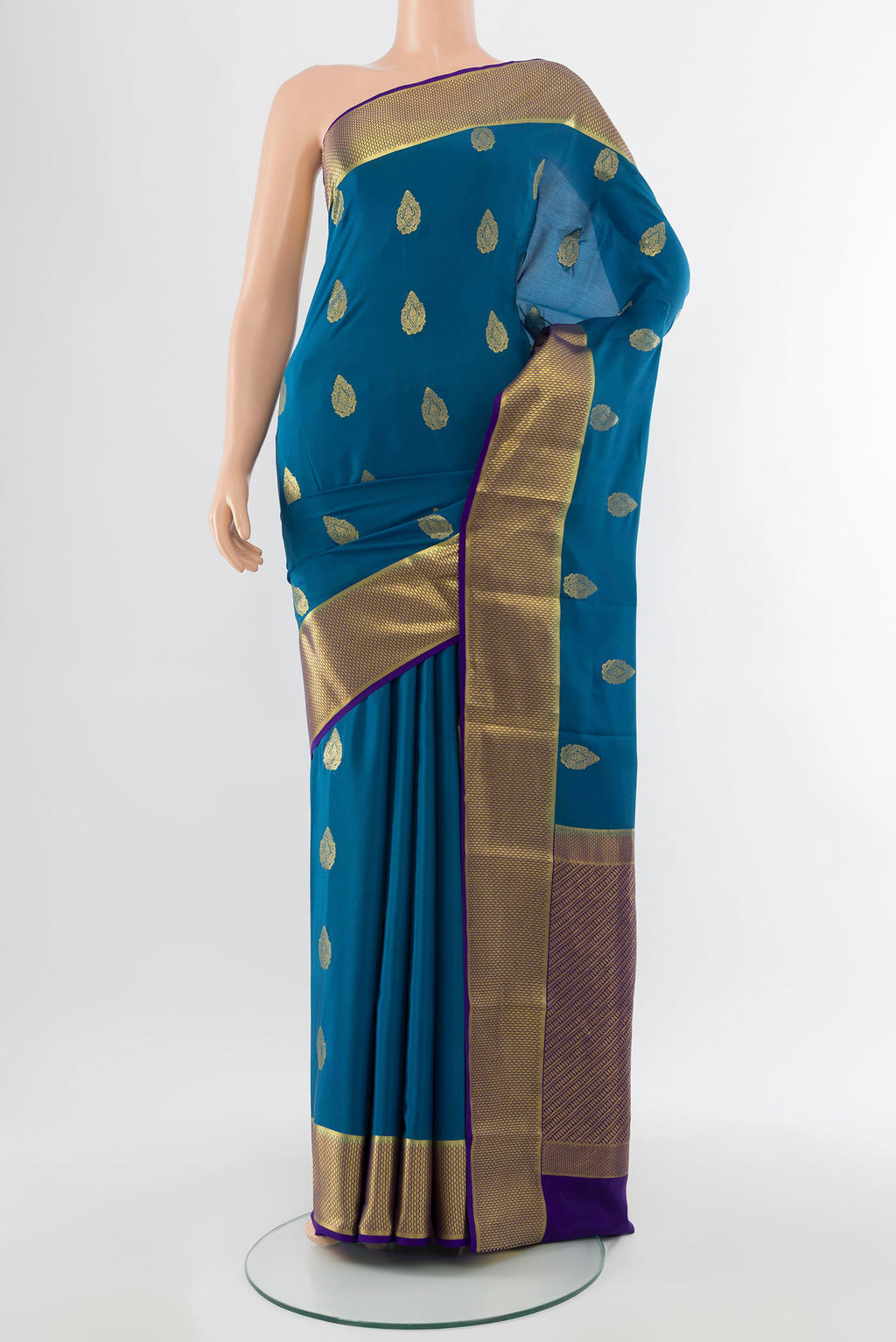 Dark Blue Mysore Crepe Saree with Zari Butta on the body and Silk Border.  displayed on a mannequin
