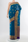 Dark Blue Mysore Crepe Saree with Zari Butta on the body and Silk Border.  displayed on a mannequin