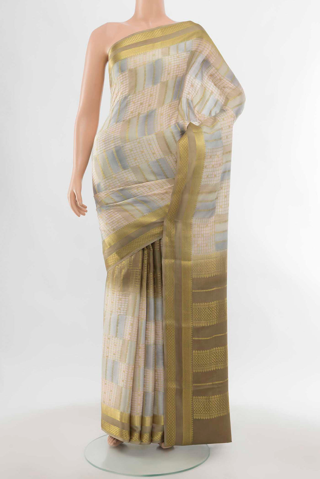 Multi Color Mysore Crepe Saree with Checked design on the body and Zari Border displayed on a mannequin