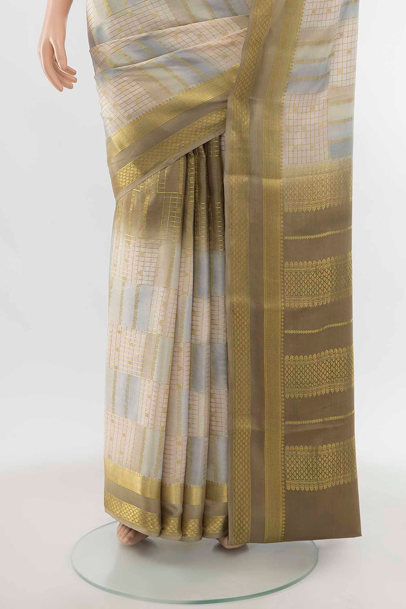 Pleats and pallu of Multi Color Mysore Crepe Saree with Checked design on the body and Zari Border