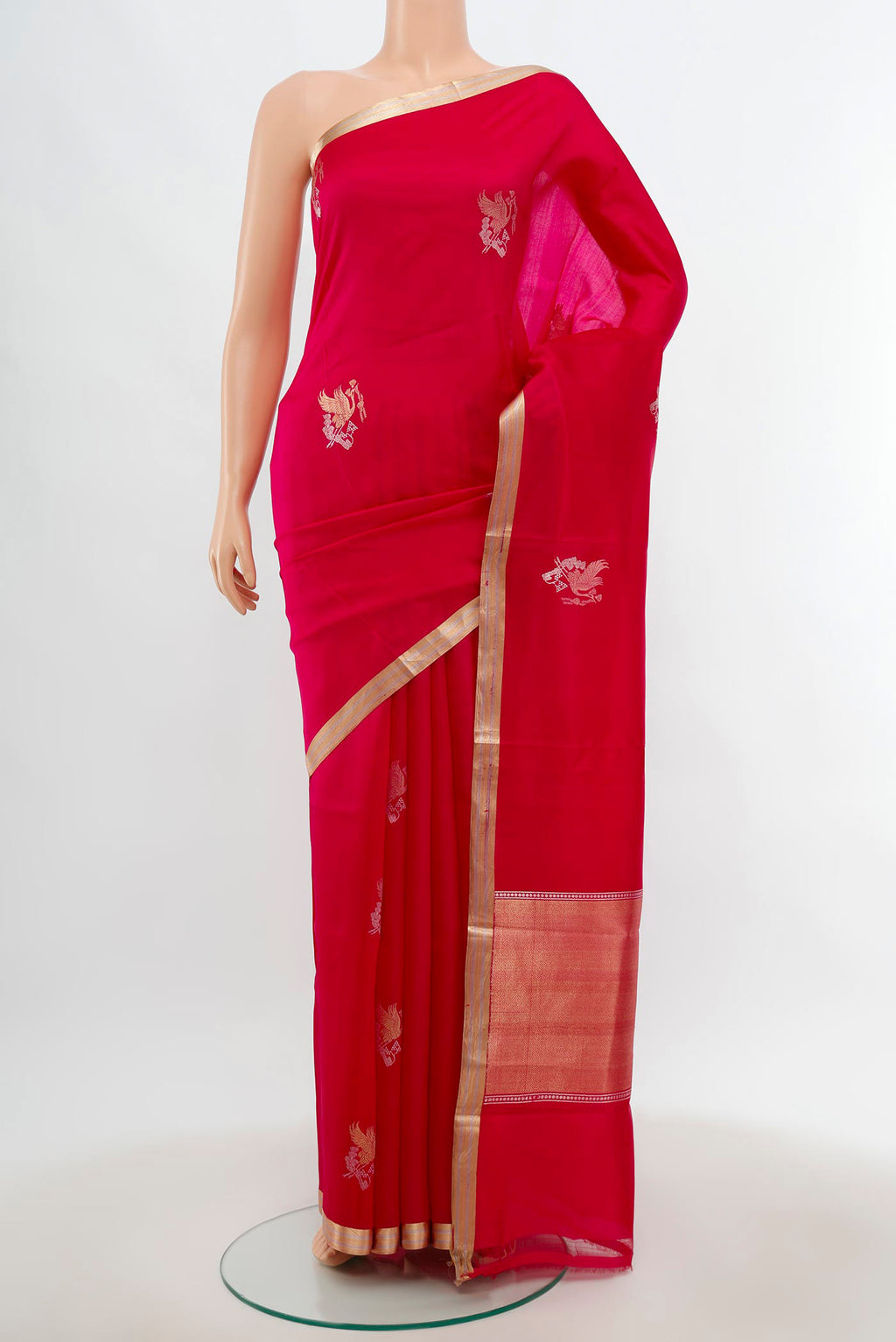 Rani Pink Banarasi Katan Silk Saree with Zari Butta on the body and Silk Border.  displayed on a mannequin
