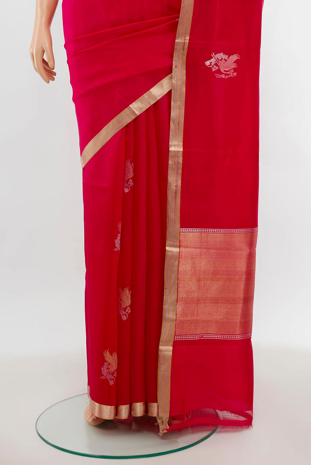Pleats and pallu of Rani Pink Banarasi Katan Silk Saree with Zari Butta on the body and Silk Border. 