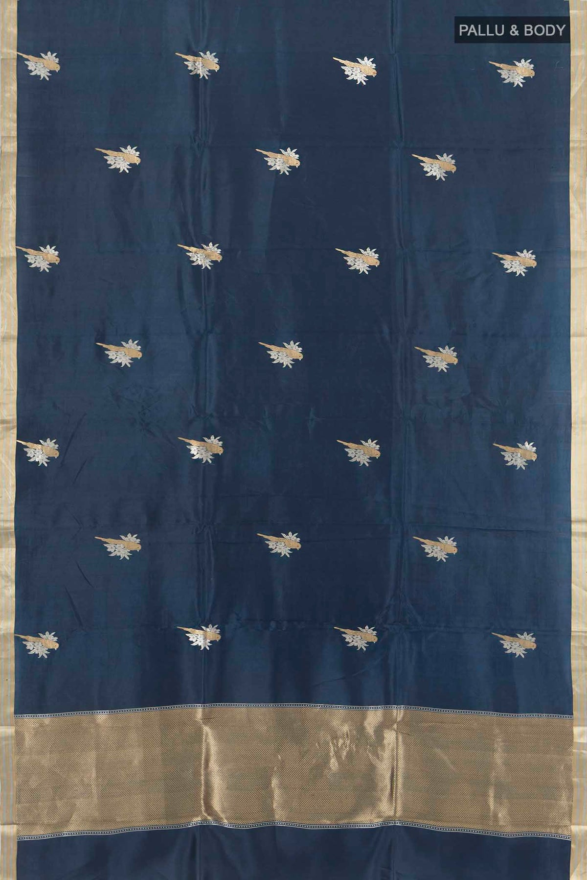 Flat view of Navy Blue Banarasi Katan Silk Saree with Zari Butta on the body and Silk Border. 