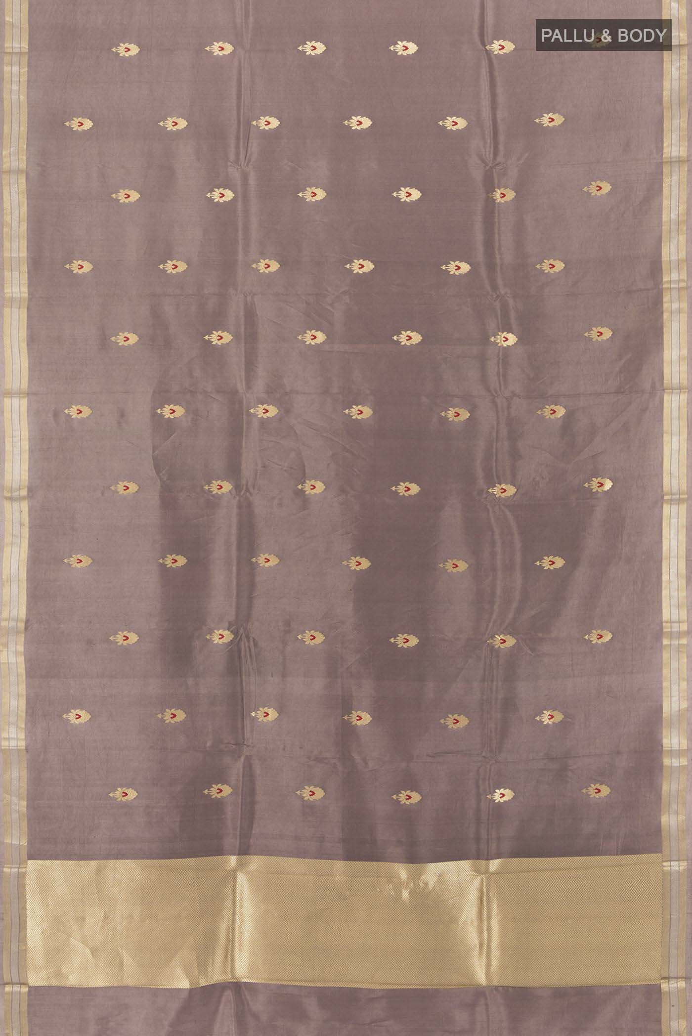 Flat view of Dark Beige Banarasi Katan Silk Saree with Zari Butta on the body and Silk Border. 